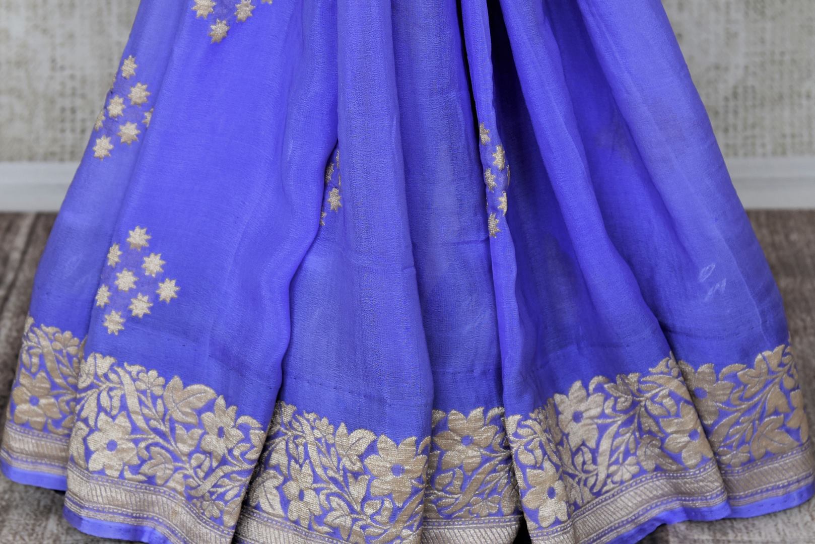 Buy mauve purple georgette Banarasi saree online in USA with silver foliate zari border. Elevate your traditional saree style with beautiful Indian Banarasi saris from Pure Elegance Indian fashion store in USA. We also have a stunning variety of bridal saris for Indian brides in USA. Shop now.-pleats