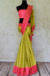 Buy pista green hand embroidered silk saree online in USA with pink border. Be the highlight of every occasion with beautiful silk sarees from Pure Elegance Indian clothing store in USA. Shop online now.-full view