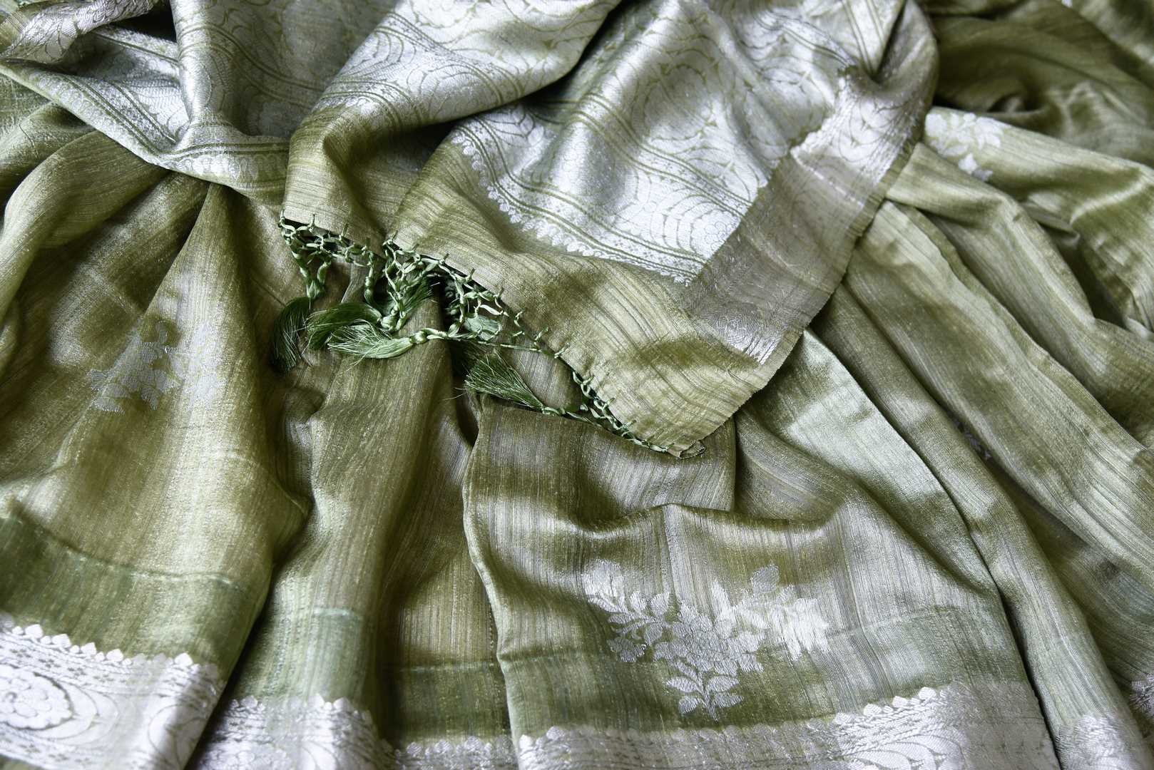 Buy pista green tussar Banarasi saree online in USA with floral zari buta and zari border. Be an epitome of elegance in exquisite Banarasi sarees from Pure Elegance Indian clothing store in USA.-details