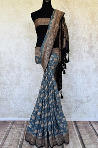 Buy steel blue georgette Banarasi saree online in USA with zari work. Feel traditional on special occasions in beautiful Indian designer saris from Pure Elegance Indian fashion store in USA. Choose from a splendid variety of Banarasi sarees, pure handwoven saris. Buy online.-full view
