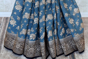 Buy steel blue georgette Banarasi saree online in USA with zari work. Feel traditional on special occasions in beautiful Indian designer saris from Pure Elegance Indian fashion store in USA. Choose from a splendid variety of Banarasi sarees, pure handwoven saris. Buy online.-pleats