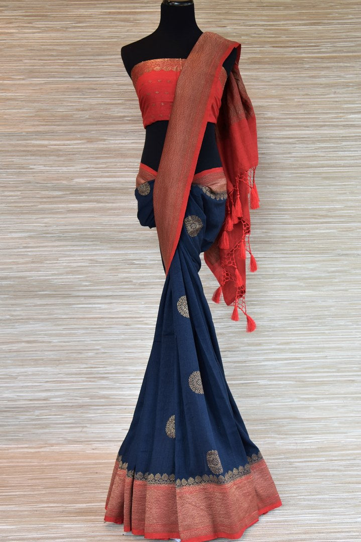 Buy navy blue muga Benarasi sari online in USA with zari buta and zari border. Radiate traditional charm with beautiful Banarasi sarees from Pure Elegance Indian clothing store in USA. Choose from a variety of handwoven saris, Banarasi silk sarees, Banarasi georgette sarees, Banarasi tussar saris for special occasions.-full view