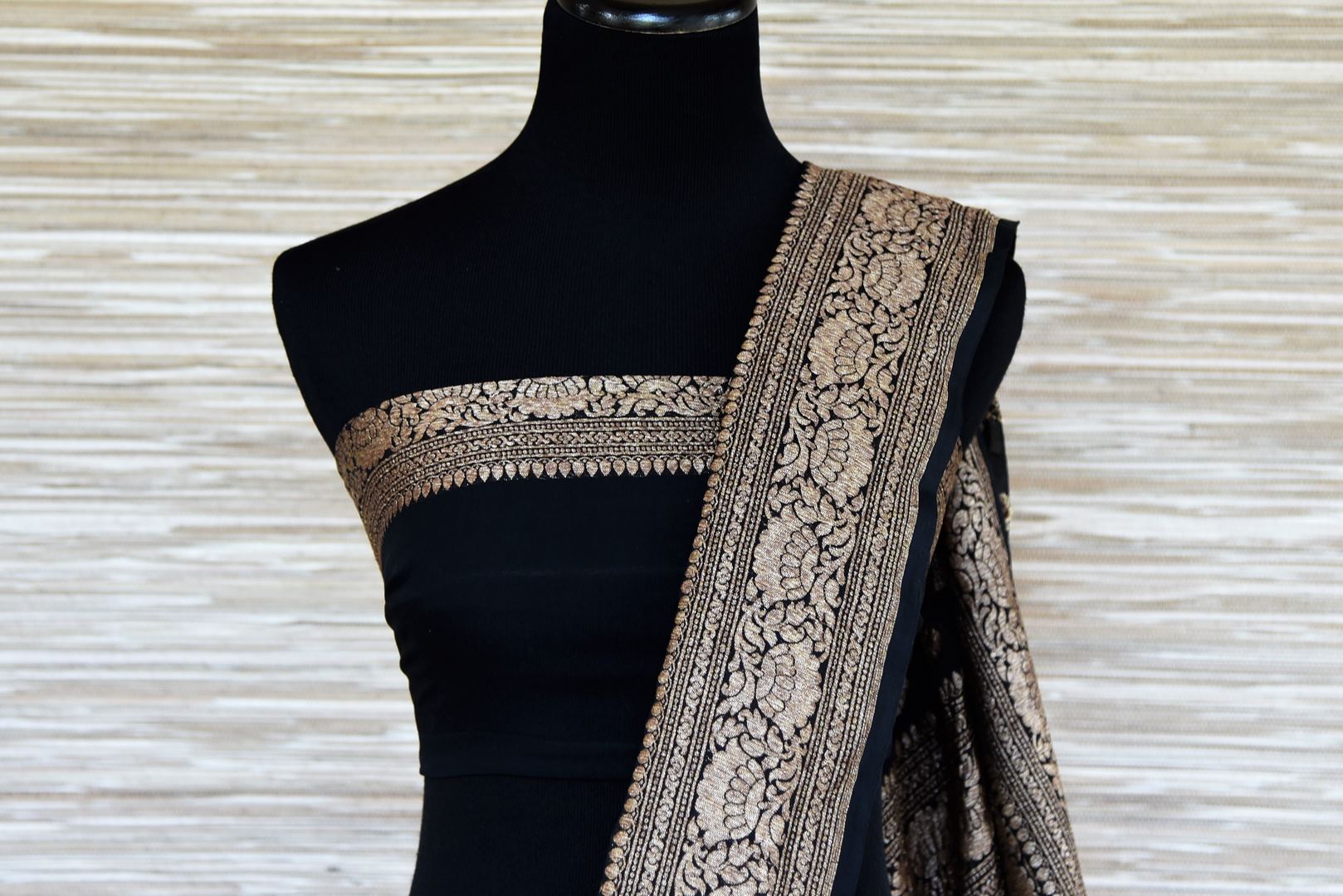 Shop black georgette Banarasi saree online in USA with silver zari buta and zari border. Make your ethnic wardrobe colorful and rich with a splendid collection of Banarasi sarees from Pure Elegance Indian clothing store in USA. Shop online.-blouse pallu
