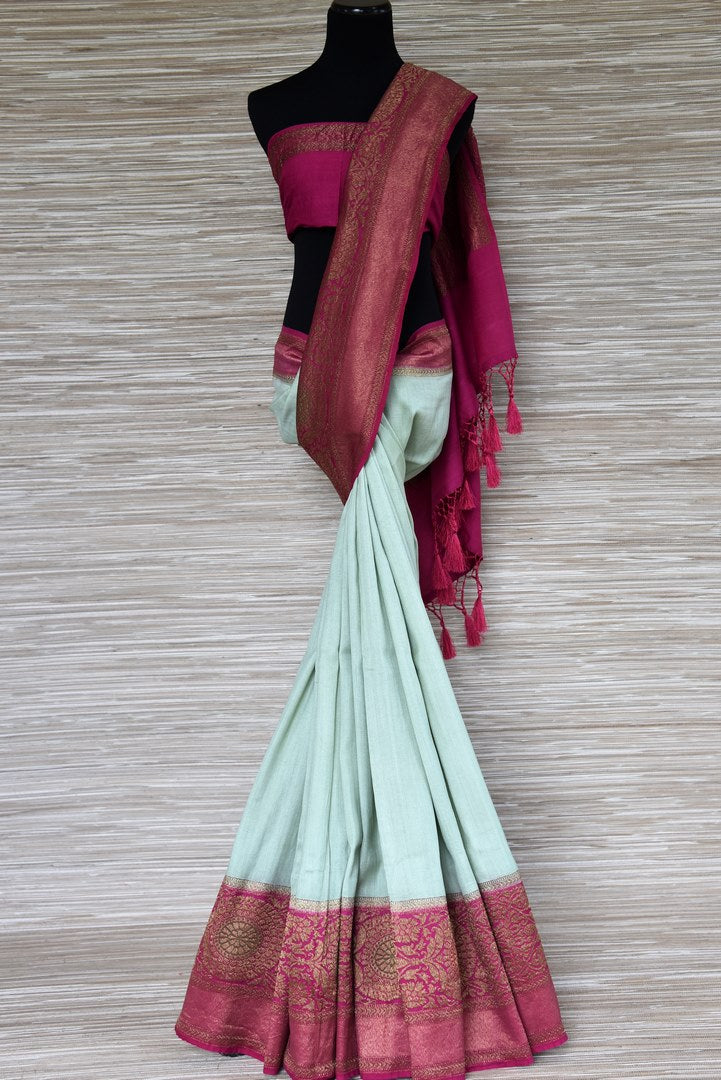 Shop mint green muga Banarasi sari online in USA with pink antique zari border. Be a vision in the beautifu Banarasi sarees from Pure Elegance Indian clothing store in USA. Shop online now.-full view