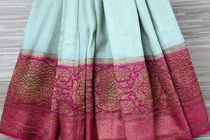 Shop mint green muga Banarasi sari online in USA with pink antique zari border. Be a vision in the beautifu Banarasi sarees from Pure Elegance Indian clothing store in USA. Shop online now.-pleats