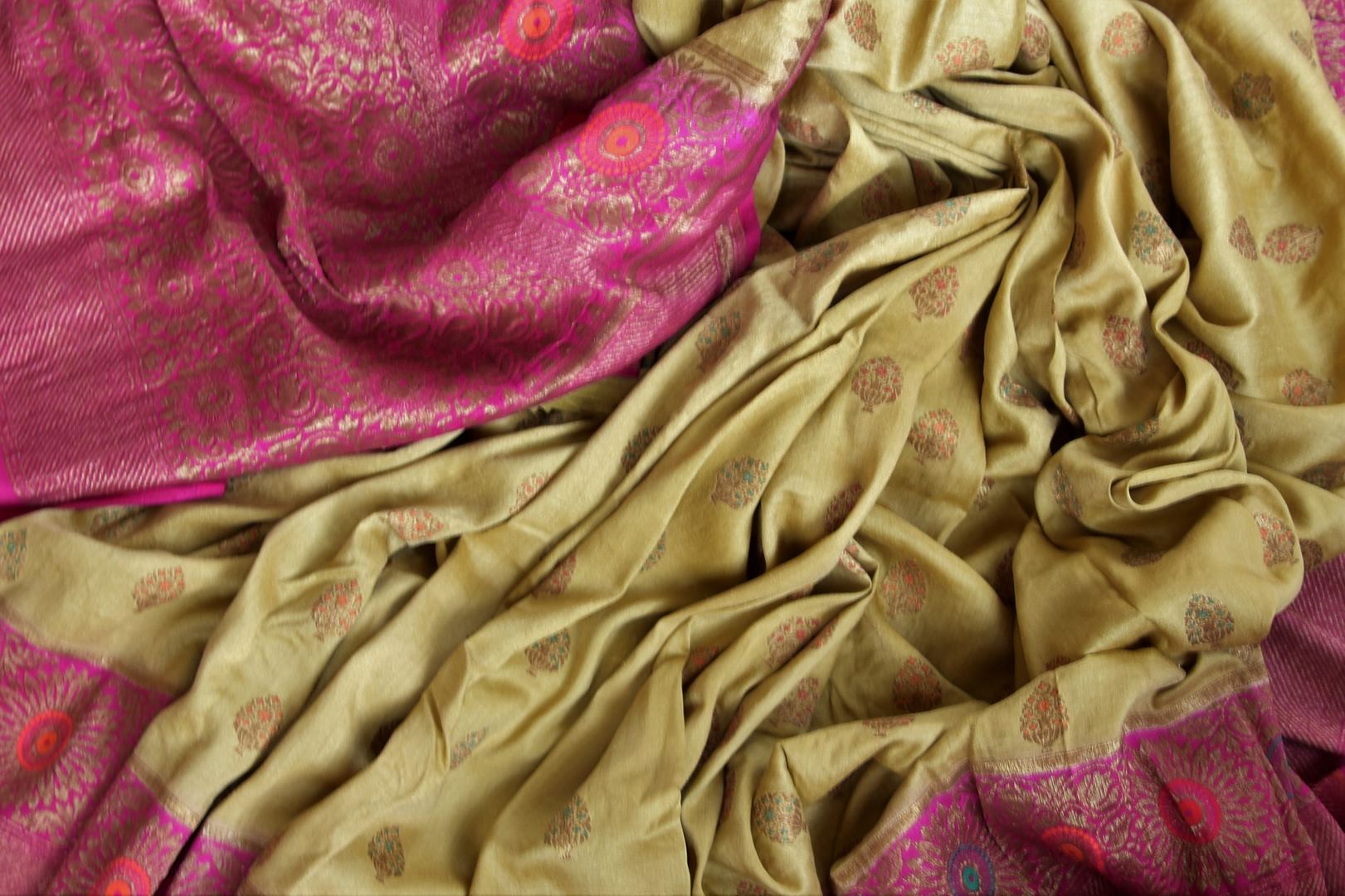 Buy pista green muga Banarasi saree online in USA with pink zari minakari border. Radiate traditional charm with beautiful Banarasi sarees from Pure Elegance Indian clothing store in USA. Choose from a variety of Banarasi silk sarees, Banarasi georgette sarees, Banarasi tussar saris for special occasions.-details