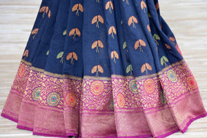 Shop navy blue muga Banarasi sari online in USA with flower minakari zari buta. Radiate traditional charm with beautiful Banarasi sarees from Pure Elegance Indian clothing store in USA. Choose from a variety of Banarasi silk sarees, Banarasi georgette sarees, Banarasi tussar saris for special occasions.-pleats