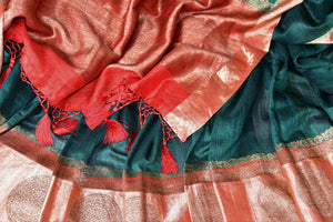 Buy dark green tussar Benarasi saree online in USA with red zari border. Be an epitome of elegance in exquisite Banarasi saris from Pure Elegance Indian clothing store in USA.-details
