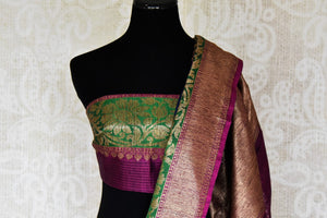 Buy blue striped tussar Benarasi saree online in USA with zari buta and purple and green antique zari border. Shine bright in best of Indian designer sarees from Pure Elegance Indian fashion store in USA on special occasions. Choose from a splendid variety of Banarasi sarees, pure handwoven saris. Shop online.-blouse pallu