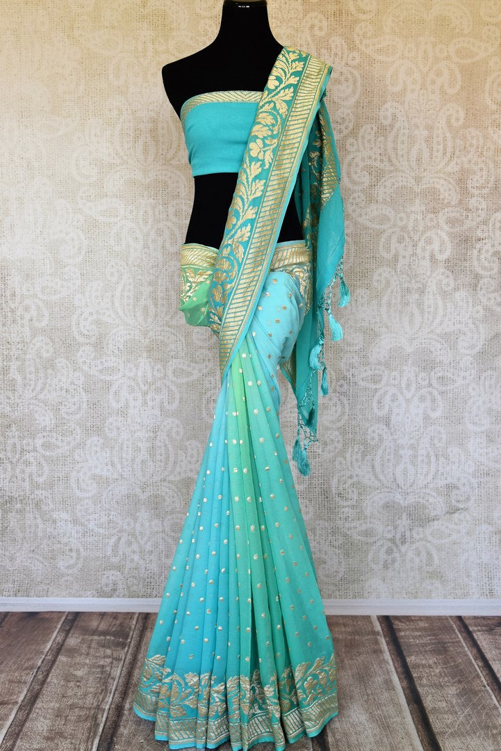 Buy traditional red georgette Banarasi sari online in USA with zari work. Feel traditional on special occasions in beautiful Indian designer saris from Pure Elegance Indian fashion store in USA. Choose from a splendid variety of Banarasi sarees, pure handwoven saris. Buy online.-full view