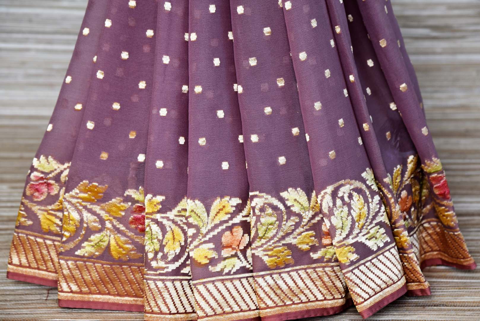 Shop mauve georgette Banarasi saree online in USA with foliate zari border. Make your ethnic wardrobe colorful and rich with a splendid collection of Banarasi saris from Pure Elegance Indian clothing store in USA. Shop online.-pleats