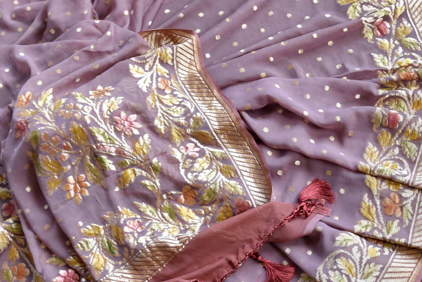 Shop mauve georgette Banarasi saree online in USA with foliate zari border. Make your ethnic wardrobe colorful and rich with a splendid collection of Banarasi saris from Pure Elegance Indian clothing store in USA. Shop online.-details