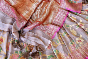 Shop dusty pink georgette Banarasi saree online in USA with zari minakari floral jaal. Feel traditional on special occasions in beautiful Indian designer saris from Pure Elegance Indian fashion store in USA. Choose from a splendid variety of Banarasi sarees, pure handwoven saris. Buy online.-details