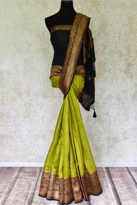 Buy lime green color tussar Benarasi saree online in USA with black zari border. Be an epitome of elegance in exquisite Banarasi saris from Pure Elegance Indian clothing store in USA.-full view