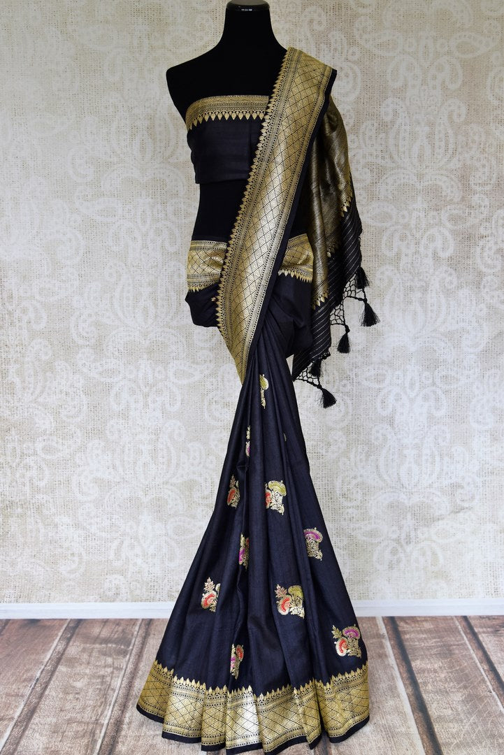 Buy black khaddi Banarasi saree online in USA with zari minakari floral buta. Feel traditional on special occasions in beautiful Indian designer saris from Pure Elegance Indian fashion store in USA. Choose from a splendid variety of Banarasi sarees, pure handwoven saris. Buy online.-full view