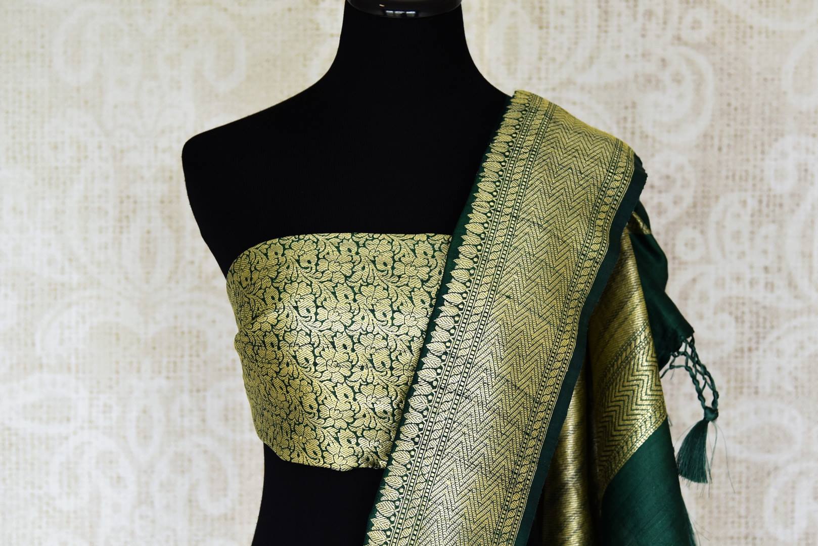 Buy bottle green khaddi Banarasi saree online in USA with minakari zari floral buta. Feel traditional on special occasions in beautiful Indian designer saris from Pure Elegance Indian fashion store in USA. Choose from a splendid variety of Banarasi sarees, pure handwoven saris. Buy online.-blouse pallu