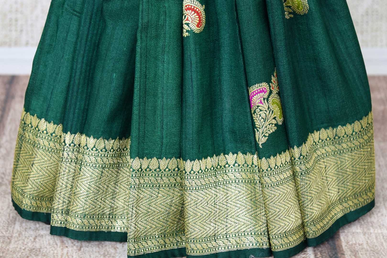 Buy bottle green khaddi Banarasi saree online in USA with minakari zari floral buta. Feel traditional on special occasions in beautiful Indian designer saris from Pure Elegance Indian fashion store in USA. Choose from a splendid variety of Banarasi sarees, pure handwoven saris. Buy online.-pleats