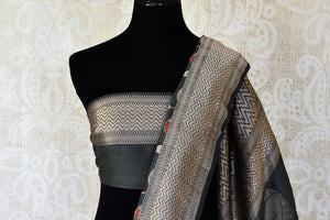 Shop dark grey khaddi Banarasi saree online in USA with zari floral work. Feel traditional on special occasions in beautiful Indian designer saris from Pure Elegance Indian fashion store in USA. Choose from a splendid variety of Banarasi sarees, pure handwoven saris. Buy online.-blouse pallu
