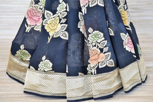 Buy midnight blue Banarasi georgette saree online in USA with flower zari buta and zari border. Make your ethnic wardrobe colorful and rich with a splendid collection of Banarasi saris from Pure Elegance Indian clothing store in USA. Shop online.-pleats