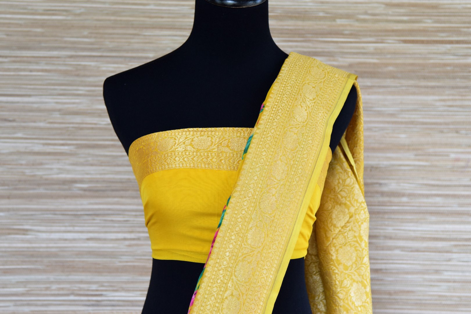 Buy bright yellow floral georgette Banarasi sari online in USA with zari border. Radiate traditional charm with beautiful Banarasi sarees from Pure Elegance Indian clothing store in USA. Choose from a variety of Banarasi silk sarees, Banarasi georgette sarees, Banarasi tussar saris for special occasions.-blouse palllu