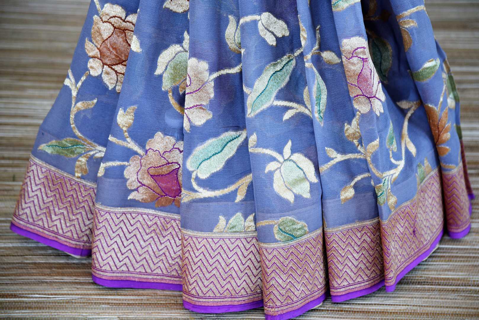 Shop blue Banarasi georgette saree online in USA with floral zari jaal. Make your ethnic wardrobe colorful and rich with a splendid collection of handwoven saris from Pure Elegance Indian clothing store in USA. Shop online.-pleats