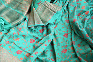 Buy green muga Benarasi sari online in USA with floral minakari zari design. Radiate traditional charm with beautiful Banarasi sarees from Pure Elegance Indian clothing store in USA. Choose from a variety of Banarasi silk sarees, Banarasi georgette sarees, Banarasi tussar saris for special occasions.-details