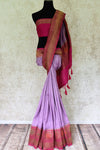 Buy lavender color muga Banarasi sari online in USA with pink minakari antique zari border. Be an epitome of elegance in exquisite Banarasi saris from Pure Elegance Indian clothing store in USA.-full view