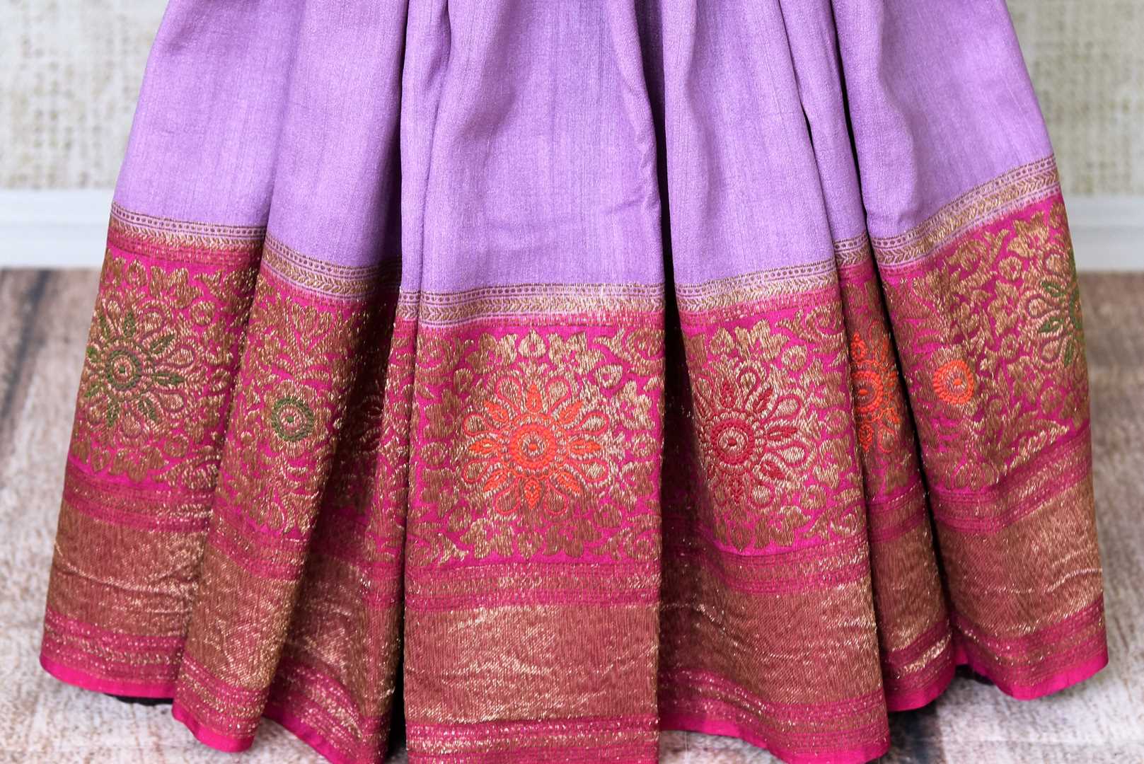 Buy lavender color muga Banarasi sari online in USA with pink minakari antique zari border. Be an epitome of elegance in exquisite Banarasi saris from Pure Elegance Indian clothing store in USA.-pleats