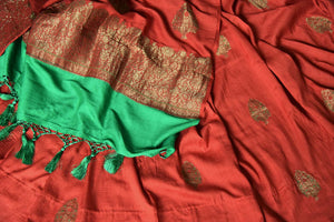 Buy red borderless muga Banarasi sari online in USA with zari minakari buta and green pallu. Be an epitome of elegance in exquisite Banarasi saris from Pure Elegance Indian clothing store in USA.-details
