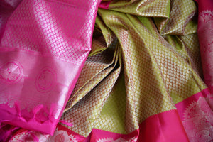 Buy green zari buta Kanjeevaram sari online in USA with pink zari buta border. Update your saree wardrobe with latest designs in Kanjeevaram silk sarees from Pure Elegance Indian clothing in USA. Shop online now.-details