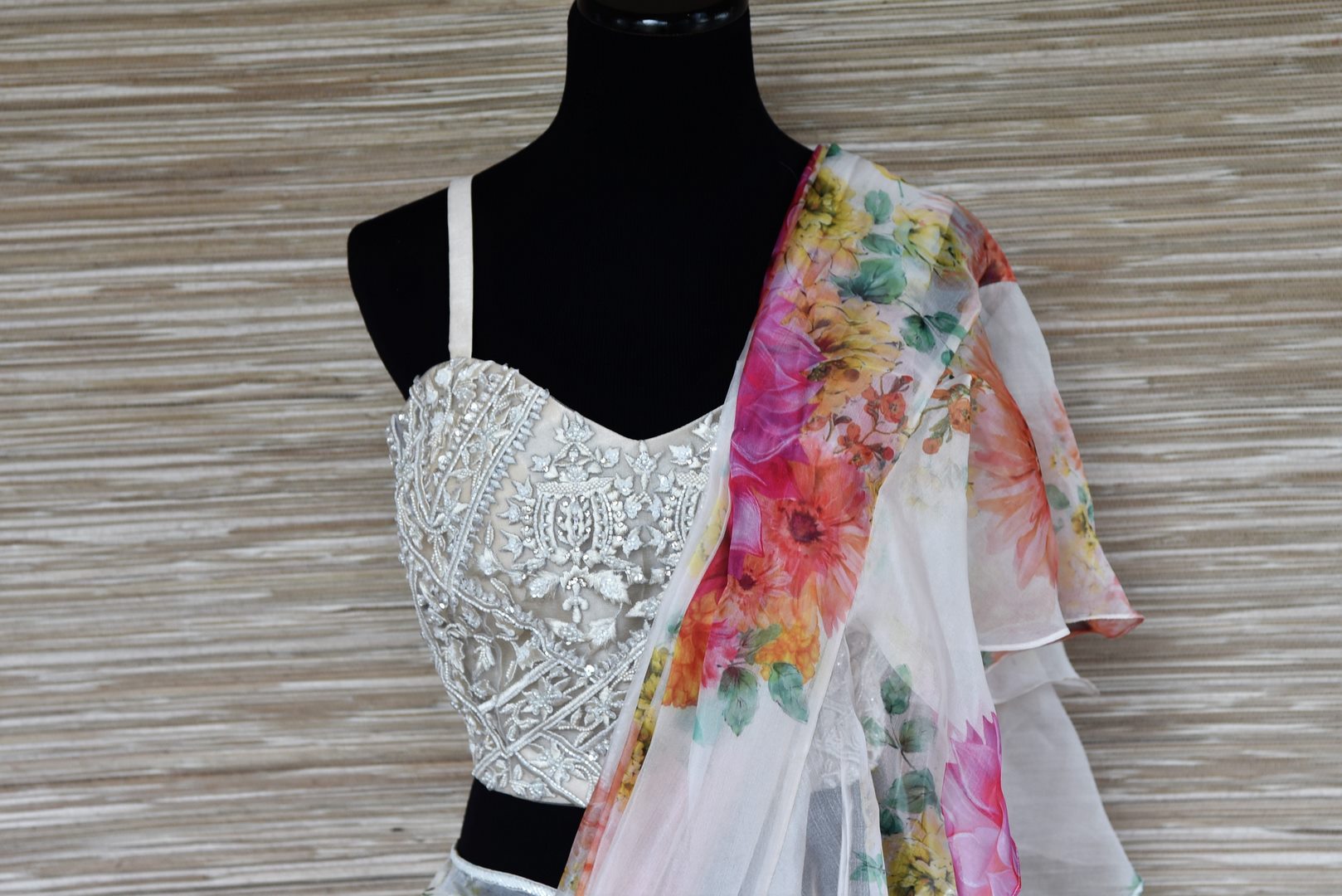 Buy gorgeous white floral georgette organza ruffle saree online in USA with designer blouse. Be a vision in the exquisite designer sarees from Pure Elegance Indian clothing store in USA. Shop online now.-blouse pallu