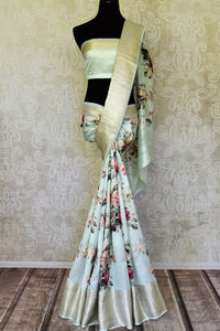 Shop powder blue floral print tussar silk sari online in USA with zari border. Shop the latest Indian women clothing and handwoven silk sarees for weddings and special occasions from Pure Elegance Indian clothing store in USA.-full view