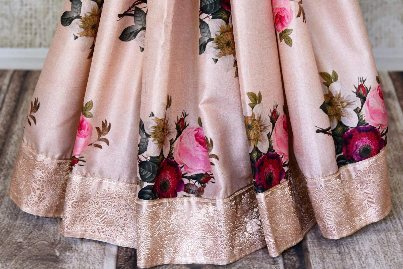 Buy beautiful powder pink floral print tussar silk sari online in USA with golden zari border. Shop the latest Indian women clothing and handwoven silk sarees for weddings and special occasions from Pure Elegance Indian clothing store in USA.-pleats