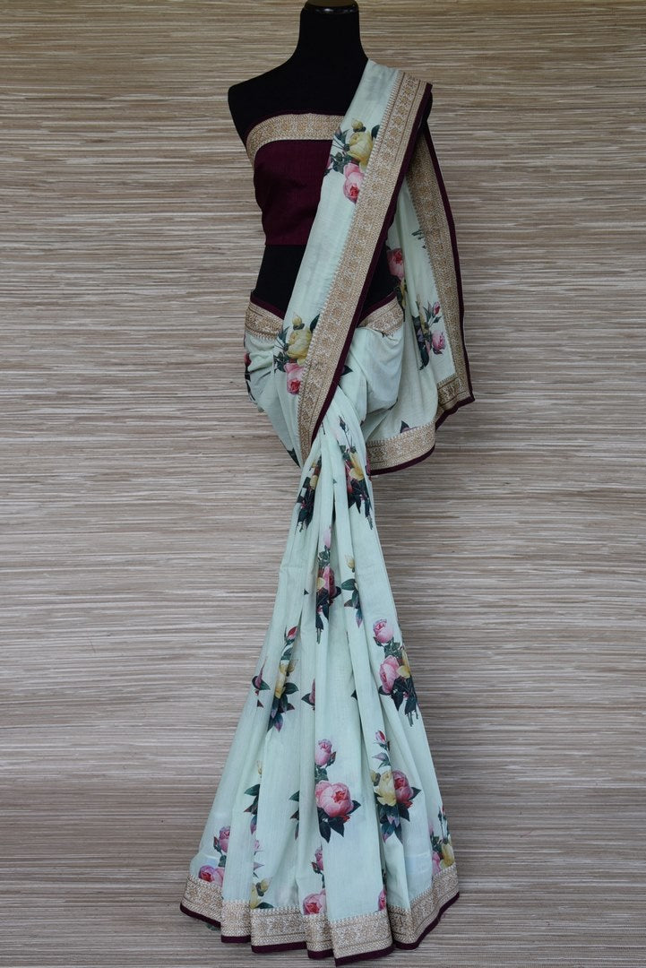 Buy mint green floral tussar georgette sari online in USA with embroidered border. Update your saree wardrobe this festive season with latest designer sarees. soft silk sarees, handwoven saris from Pure Elegance women's Indian clothing store in USA. Shop online  now.-full view