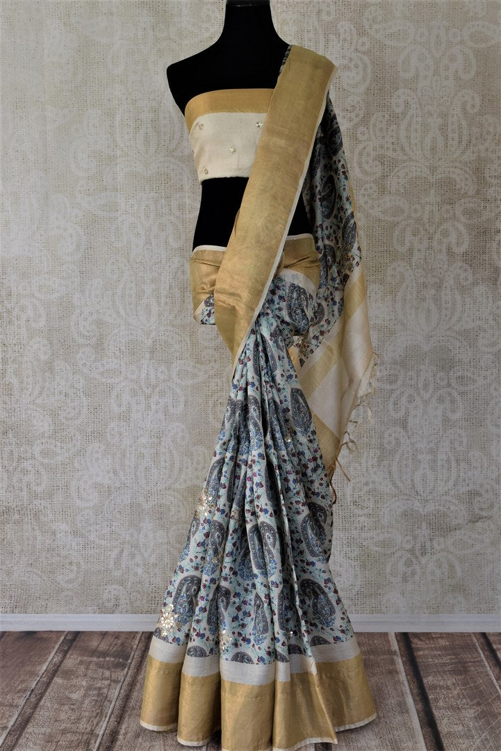 Buy gorgeous cream gota work printed tussar saree online in USA with golden border. Set high fashion standards with your exceptional choice of handwoven sarees, soft silk sarees from Pure Elegance Indian fashion store in USA.-full view
