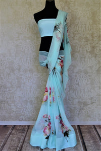 Shop charming pastel blue floral georgette saree online in USA. Shop such gorgeous printed sarees, designer sarees in USA from Pure Elegance Indian clothes store in USA for special occasions.-full view
