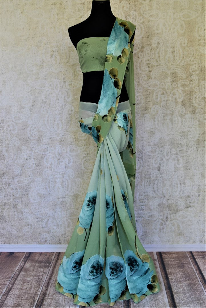 Shop olive green georgette saree online in USA with blue floral print. Shop such gorgeous printed sarees, designer sarees in USA from Pure Elegance Indian clothes store in USA for special occasions.-full view