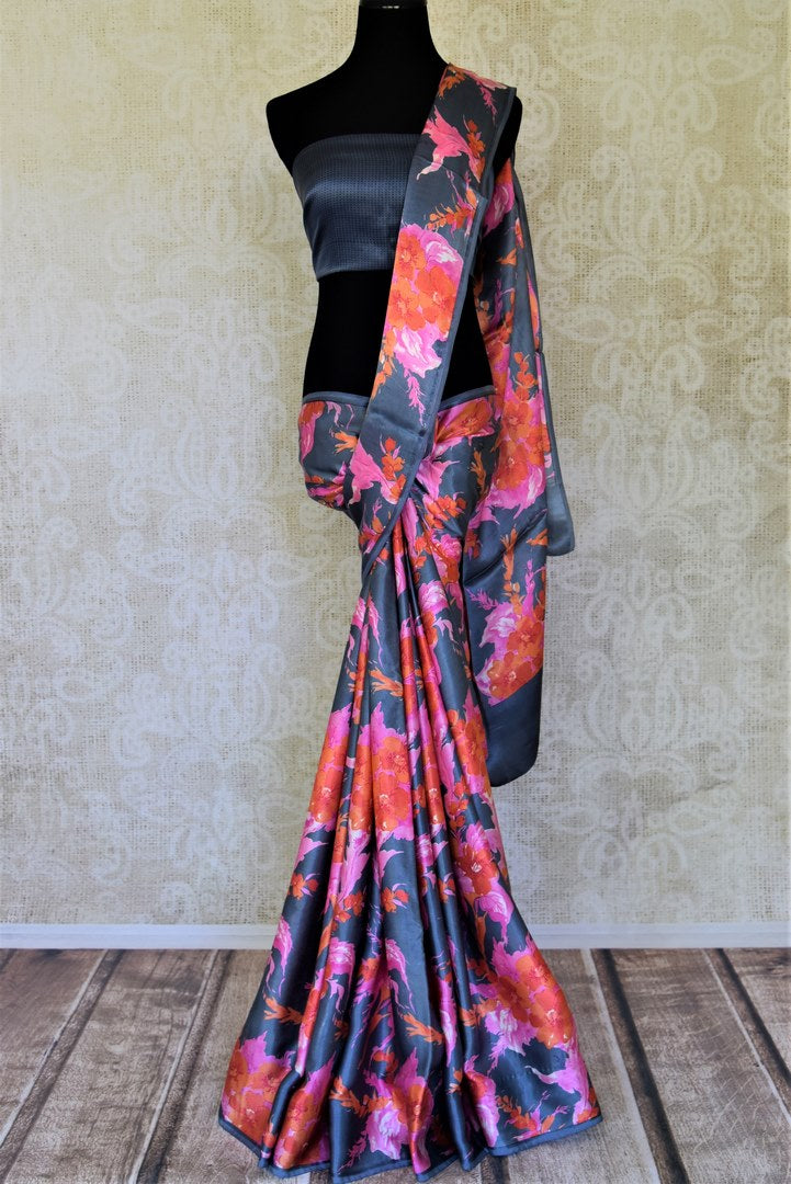 Shop gorgeous grey crepe silk sari online in USA with bright floral print. Be the center of attraction at parties and weddings with exquisite designer saris, print sarees, Bollywood sarees from Pure Elegance Indian fashion store in USA.-full view