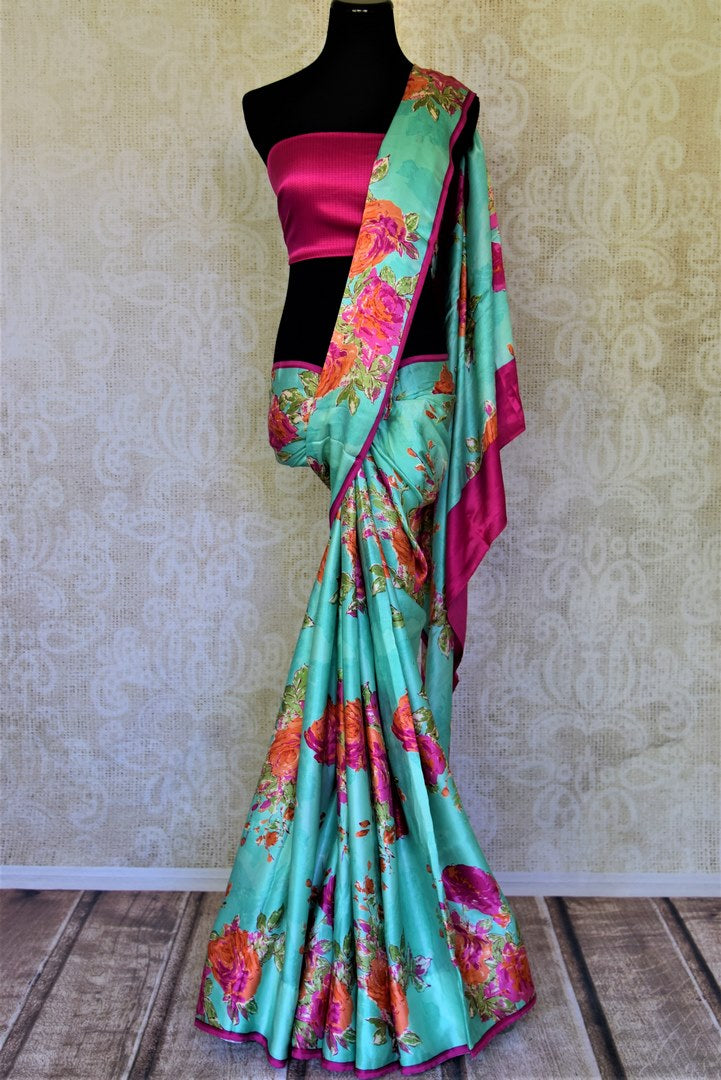 Buy beautiful turquoise green pink floral print crepe silk saree online in USA. Be the center of attraction at parties and weddings with exquisite designer sarees, print sarees, Bollywood sarees from Pure Elegance Indian fashion store in USA.-full view