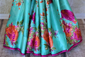 Buy beautiful turquoise green pink floral print crepe silk saree online in USA. Be the center of attraction at parties and weddings with exquisite designer sarees, print sarees, Bollywood sarees from Pure Elegance Indian fashion store in USA.-pleats