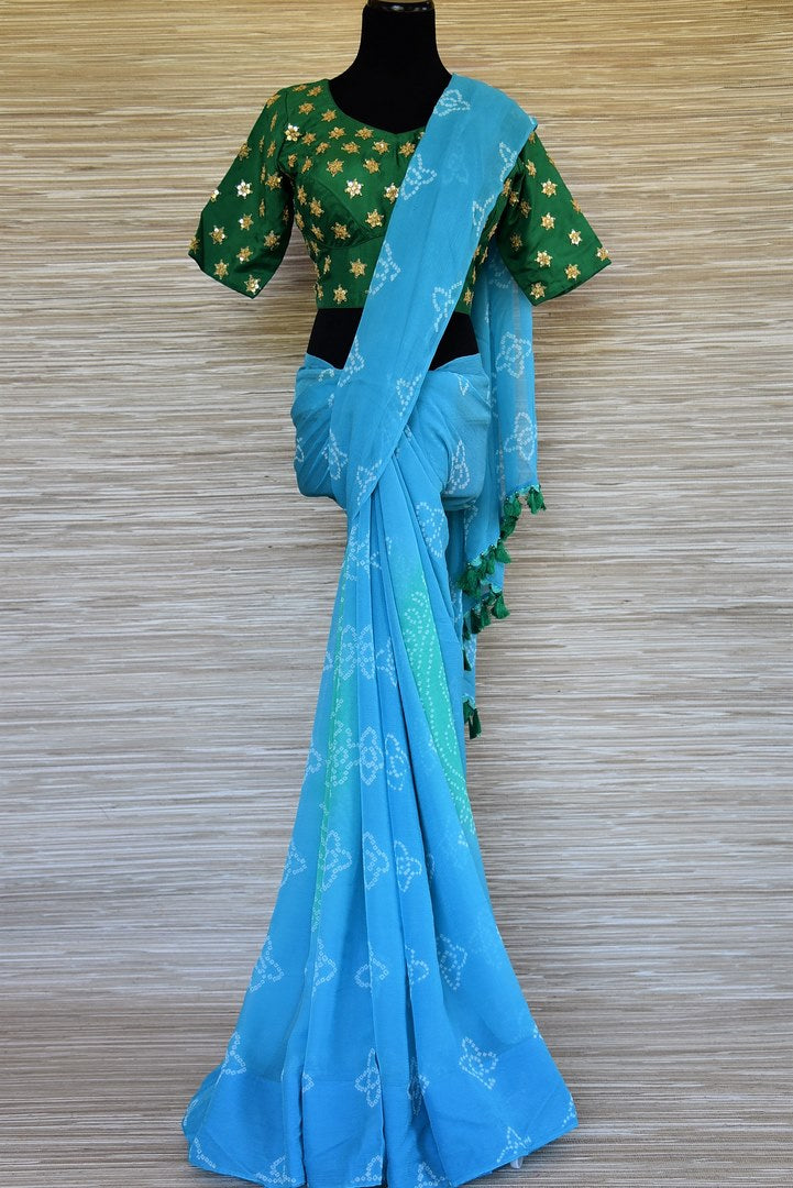 Shop elegant sky blue Bandhej chiffon saree online in USA with embroidered green saree blouse. Be an epitome of elegance and tradition in exquisite designer saris, handwoven saris from Pure Elegance clothing store in USA. -full view
