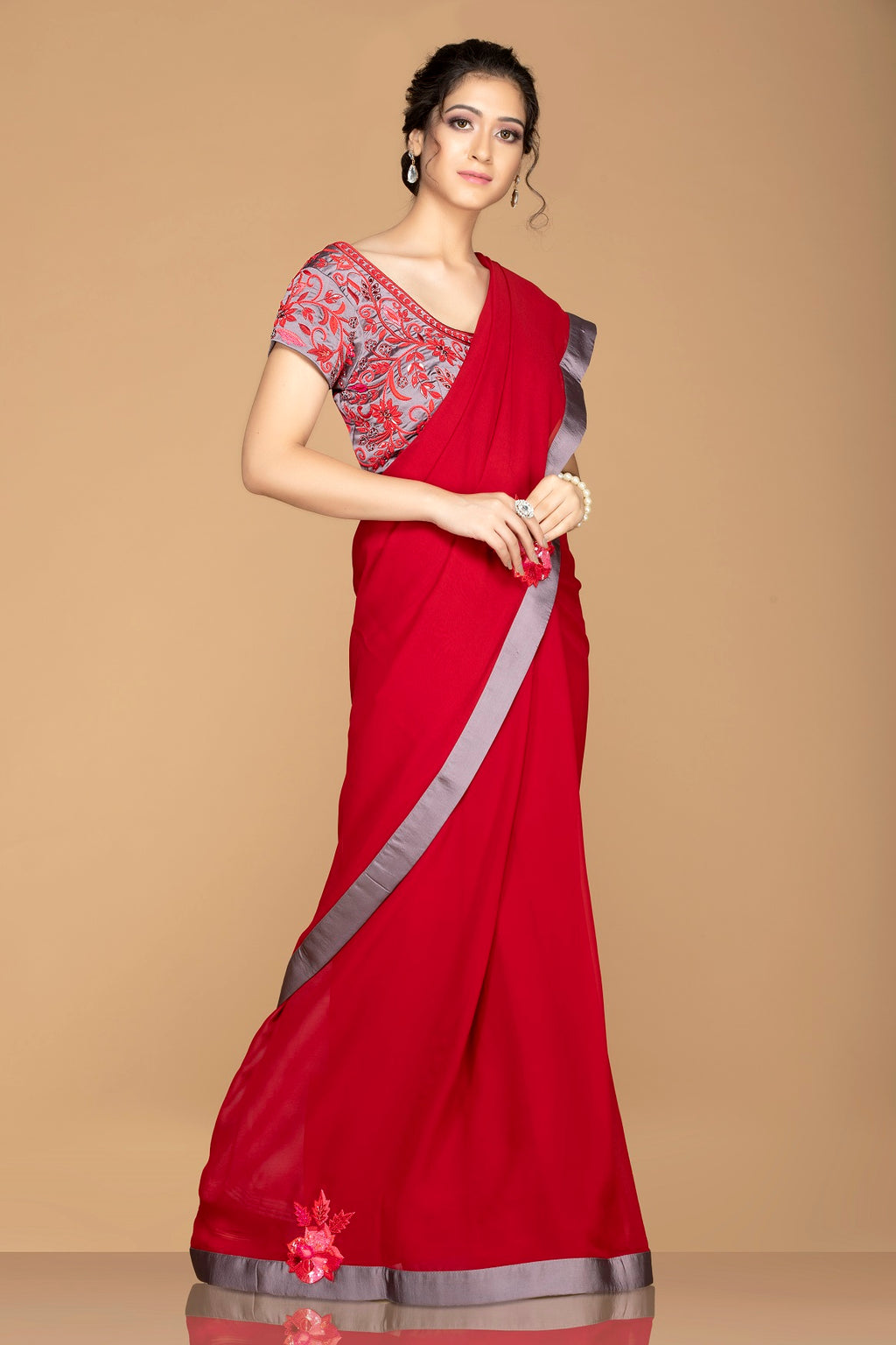 Buy bright red designer saree online in USA with grey embroidered sari blouse. Elevate your sartorial choice with exclusive Indian designer sarees with blouse, embroidered sarees, pure silk sarees from Pure Elegance Indian fashion store in USA.-full view