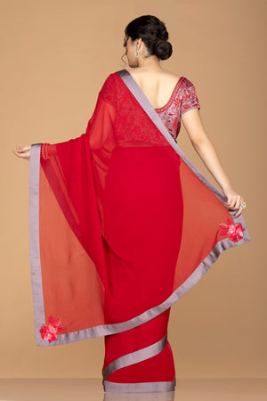 Buy bright red designer saree online in USA with grey embroidered sari blouse. Elevate your sartorial choice with exclusive Indian designer sarees with blouse, embroidered sarees, pure silk sarees from Pure Elegance Indian fashion store in USA.-back