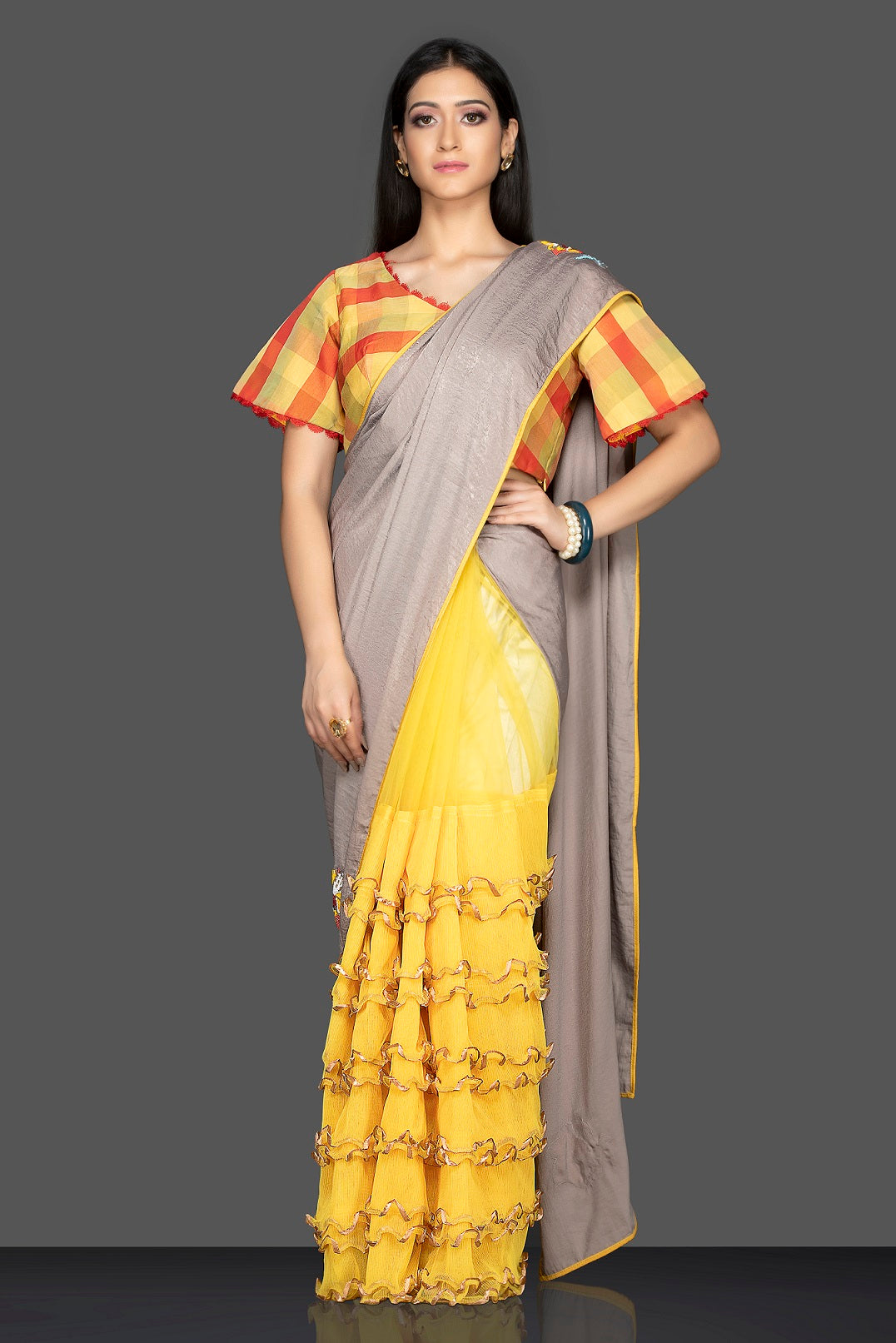 Shop grey and yellow designer saree online in USA and check saree blouse. Elevate your sartorial choice with exclusive Indian designer sarees with blouse, embroidered sarees, pure silk sarees from Pure Elegance Indian fashion store in USA.-front