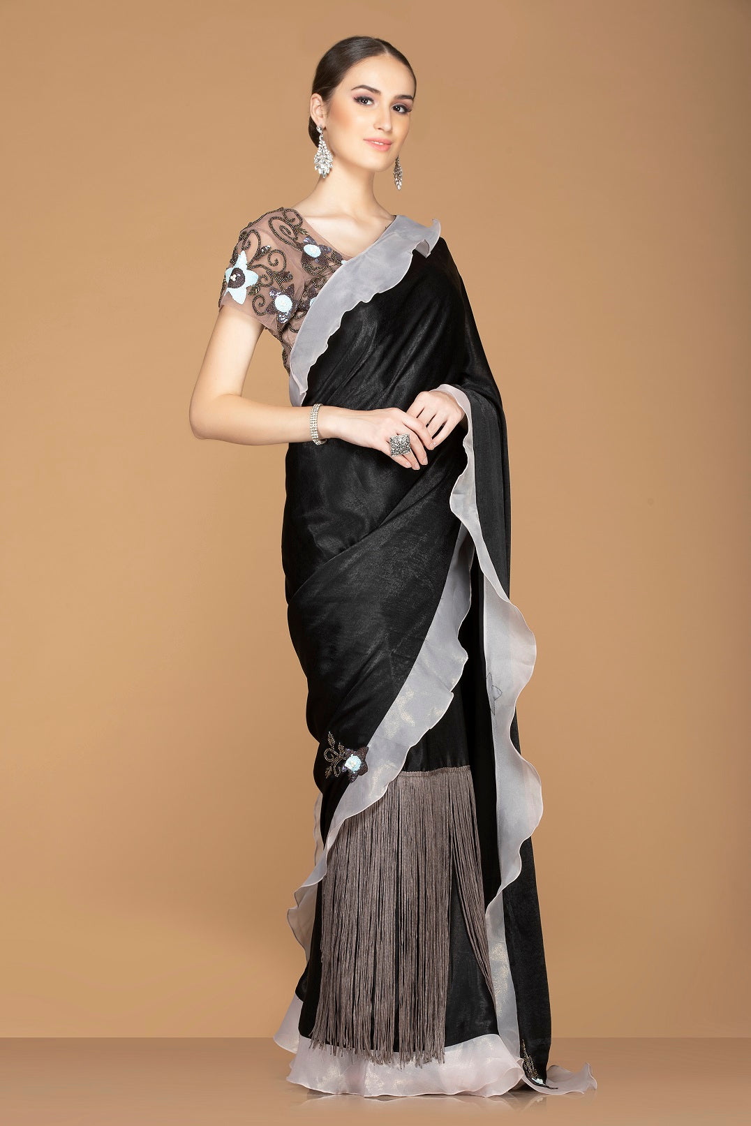 Shop black fringe saree online in USA and ruffle border and embroidered saree blouse. Elevate your sartorial choice with exclusive Indian designer sarees with blouse, embroidered sarees, party sarees from Pure Elegance Indian fashion store in USA.-side