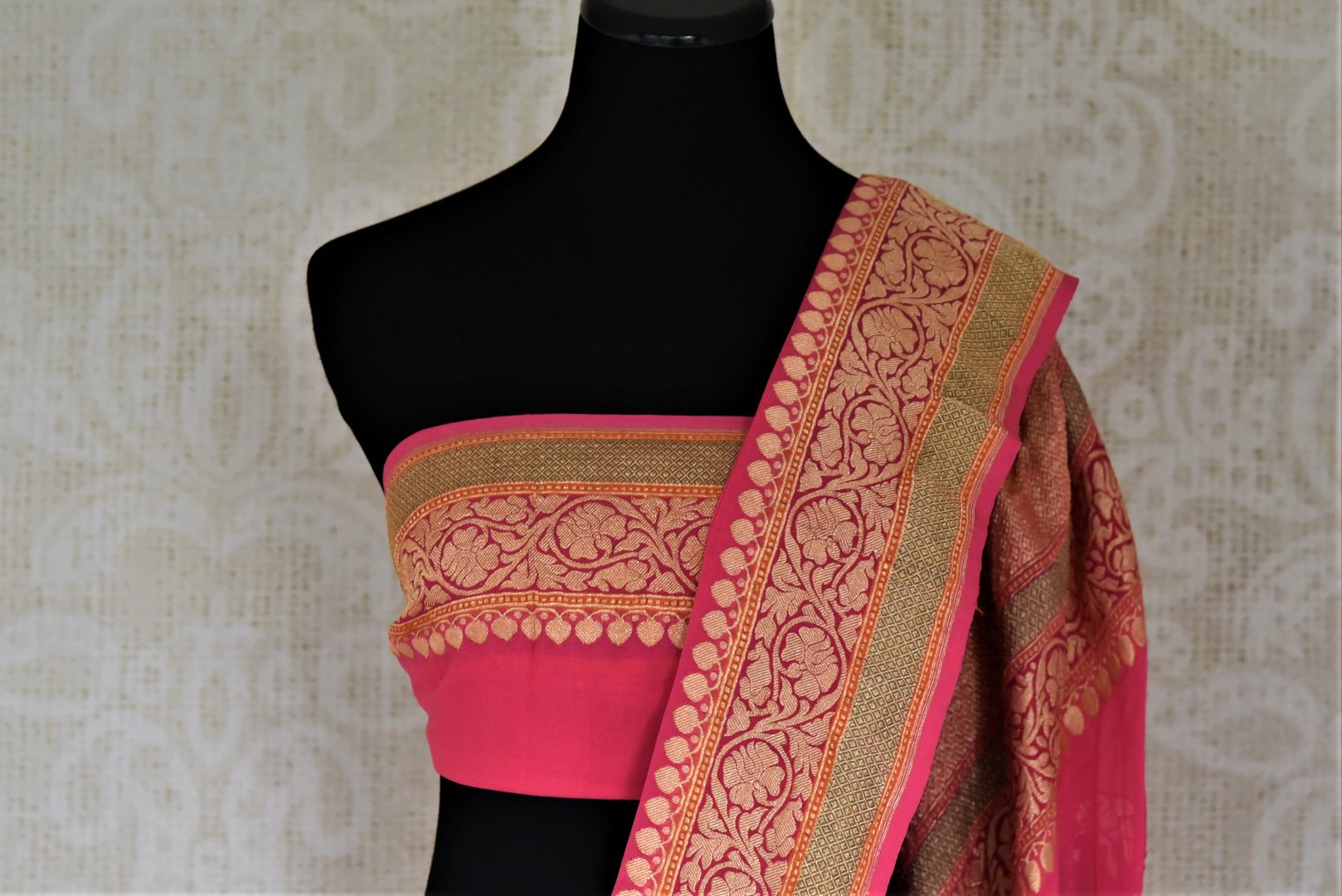 Buy bright pink paisley zari buta georgette Banarasi sari online in USA. Go for an extraordinary traditional look with splendid handwoven sarees, embroidered sarees with blouses, Banarasi saris from Pure Elegance from Indian cloth store in USA.  Shop online or visit our store now.-blouse pallu