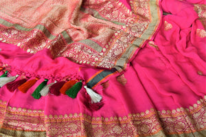 Buy bright pink paisley zari buta georgette Banarasi sari online in USA. Go for an extraordinary traditional look with splendid handwoven sarees, embroidered sarees with blouses, Banarasi saris from Pure Elegance from Indian cloth store in USA.  Shop online or visit our store now.-details