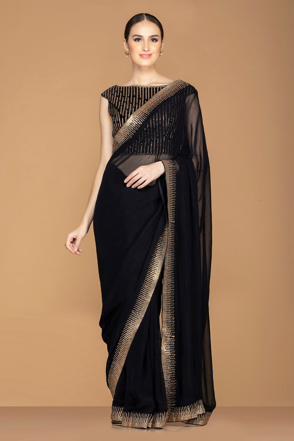 Buy ravishing black designer embroidered saree online in USA with black embroidered saree blouse. Champion ethnic fashion with a splendid collection of designer sarees, embroidered sarees with blouse, weddings sarees from Pure Elegance Indian fashion store in USA.-full view