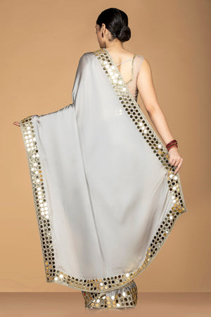 Buy online light grey saree online in USA with embroidered border and sari blouse. Champion ethnic fashion with a splendid collection of designer sarees, embroidered sarees with blouse, weddings sarees from Pure Elegance Indian fashion store in USA.-back