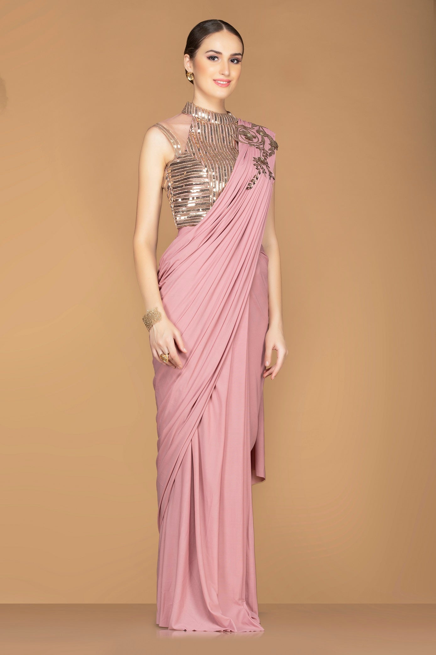 Buy beautiful rose pink draped pallu sari online in USA with designer sari blouse. Champion ethnic fashion with a splendid collection of designer sarees, embroidered sarees with blouse, weddings sarees from Pure Elegance Indian fashion store in USA.-side